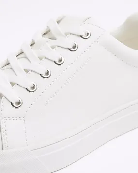 White lace up trainers